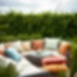 Variety of outdoor cushions arranged on a patio setting showcasing different materials and colors