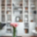 Elegant white bookshelf displaying a curated collection of books and decor items