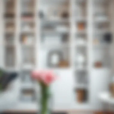 Curated Elegance in White Elegant white bookshelf displaying a curated collection of books and decor items