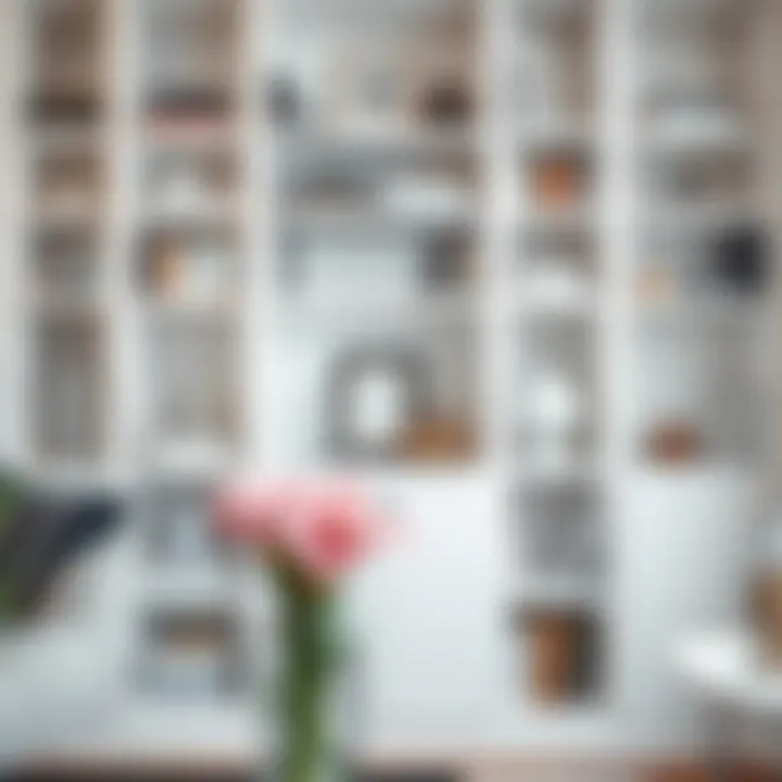 Curated Elegance in White Elegant white bookshelf displaying a curated collection of books and decor items