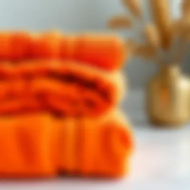Close-up of soft orange towels showcasing their texture and quality