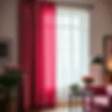Luxurious Window Treatment Luxurious pink blackout drapes elegantly framing a window