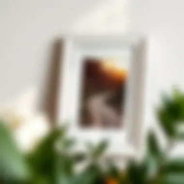 Close-up of a white wood frame displaying an art piece