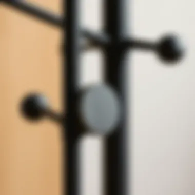 Detail of Black Coat Tree Stand Materials Close-up of the craftsmanship and material of a black coat tree stand