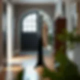 Contemporary Black Coat Tree Stand in Entryway A stylish black coat tree stand in a modern entryway