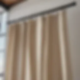 Stylish outdoor curtain rod with curtains swaying in the breeze